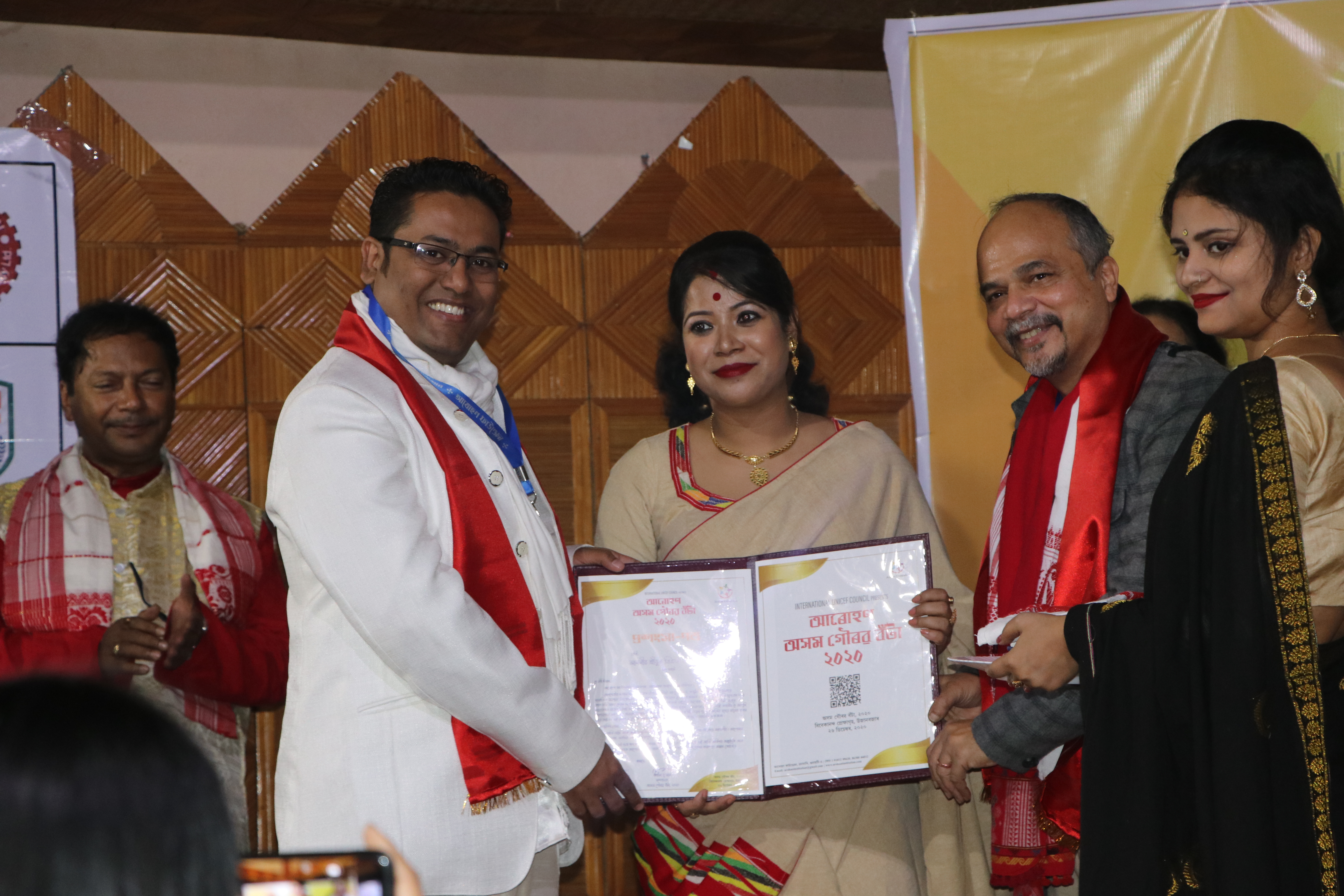 Dr. Vikram Talukdar receiving an award — recognition 3